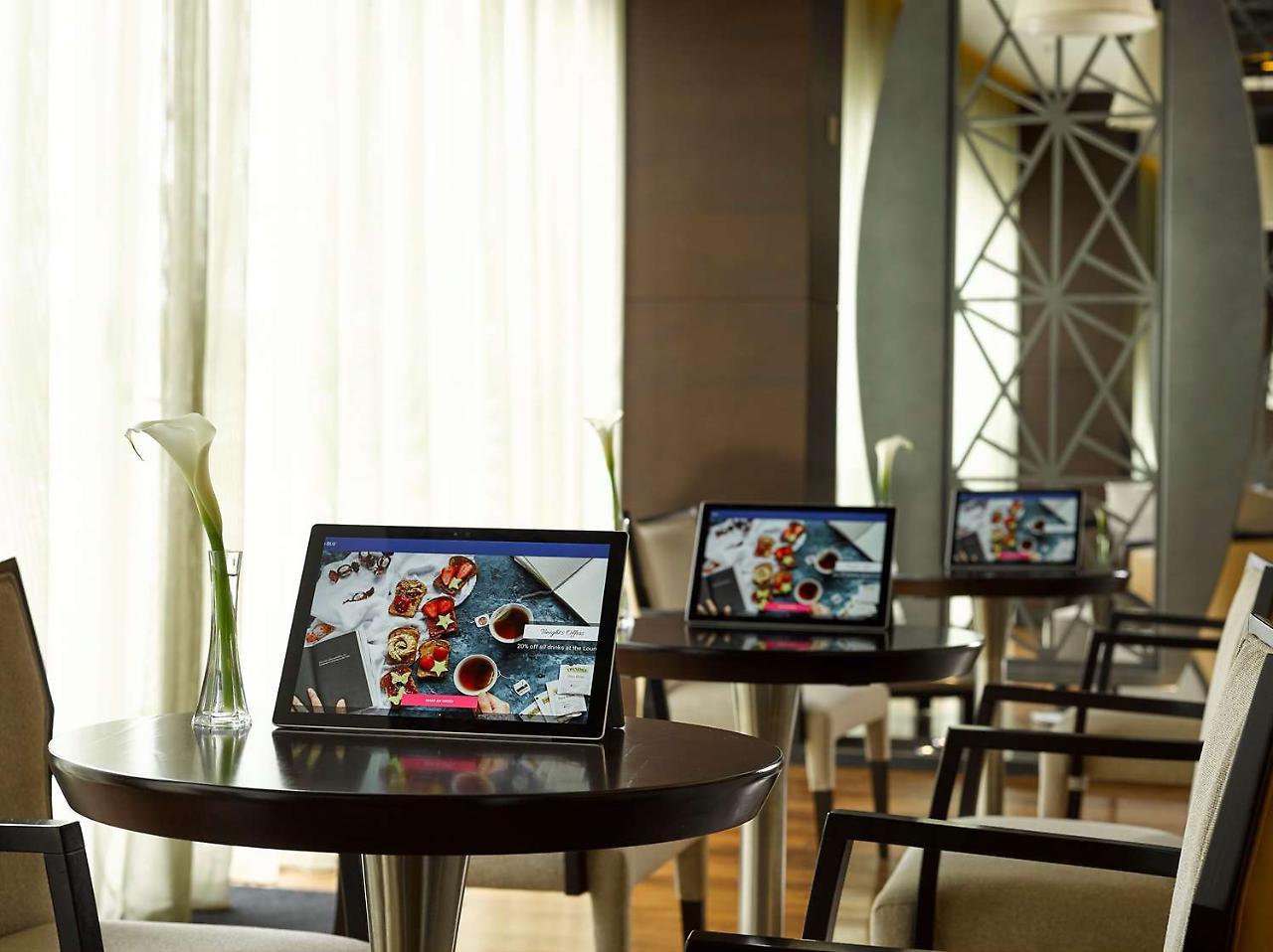 Radisson Blu Hotel & Convention Centre Kigali Exterior photo A tablet computer