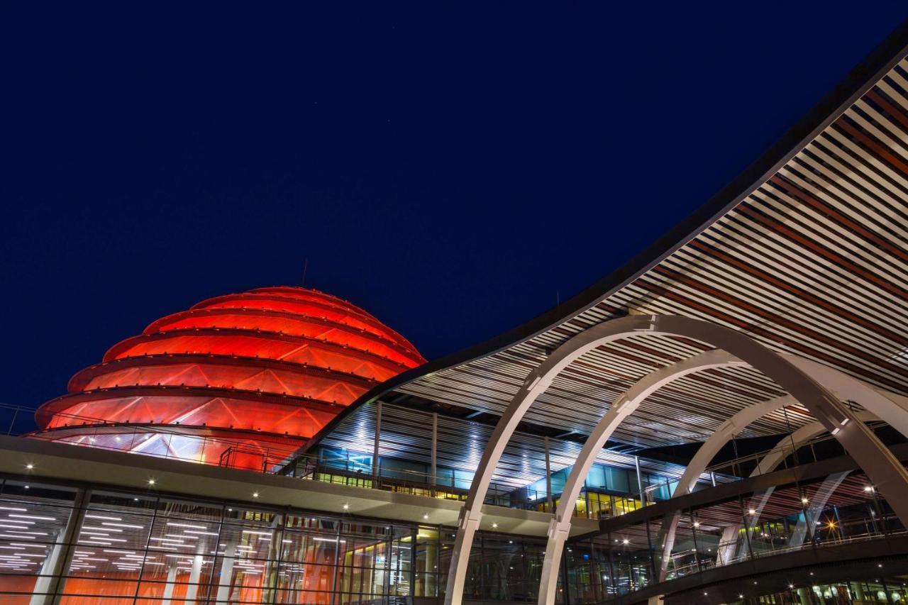 Radisson Blu Hotel & Convention Centre Kigali Exterior photo The station at night